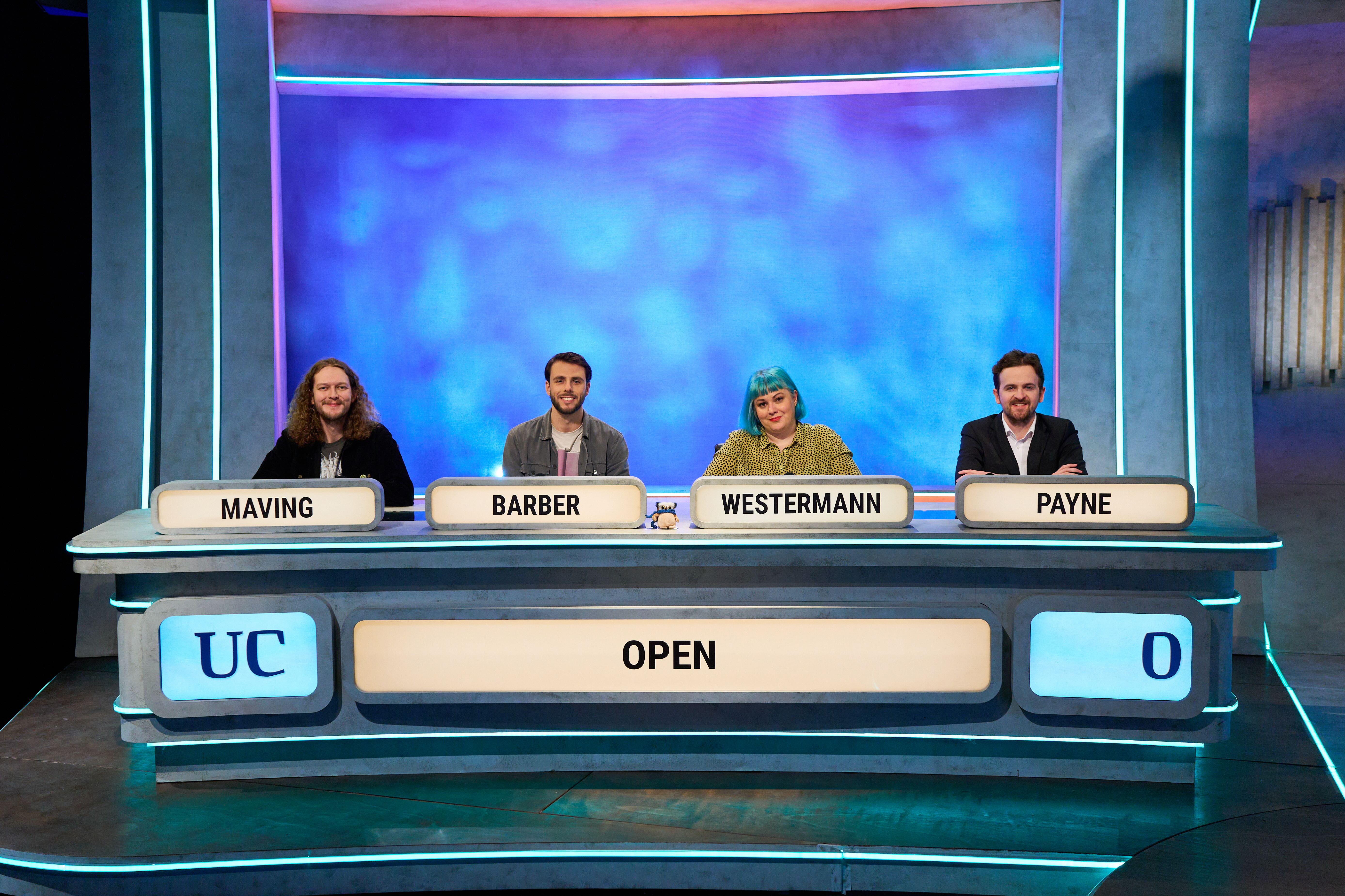 A photograph of the 2024 University Challenge team smiling at camera, from left to right Maving, Barber, Westermann, Payne.